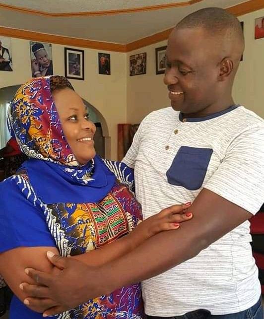 Catherine Kusasira smiles with her husband, Fred Seruga 