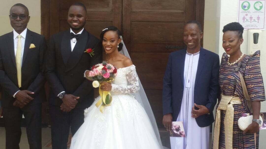 a happy Joan Namutebi and Derrick shortly after tying the knot on Friday 10th December 