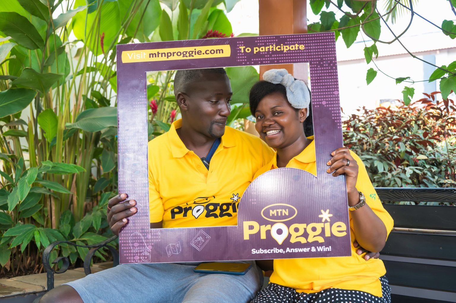 The MTN Proggie overall winner Alex Tusingwire with his lovely wife. He wins an all paid trip to Sipi falls.jpg