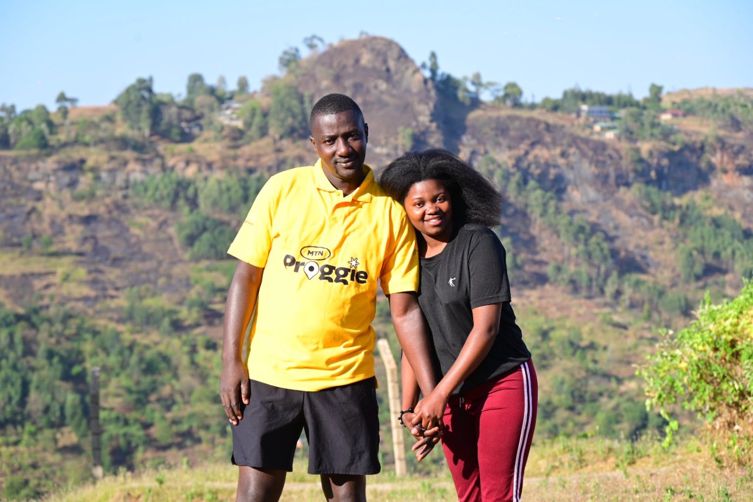 The MTN Proggie overall winner Alex Tusingwire with his lovely wife