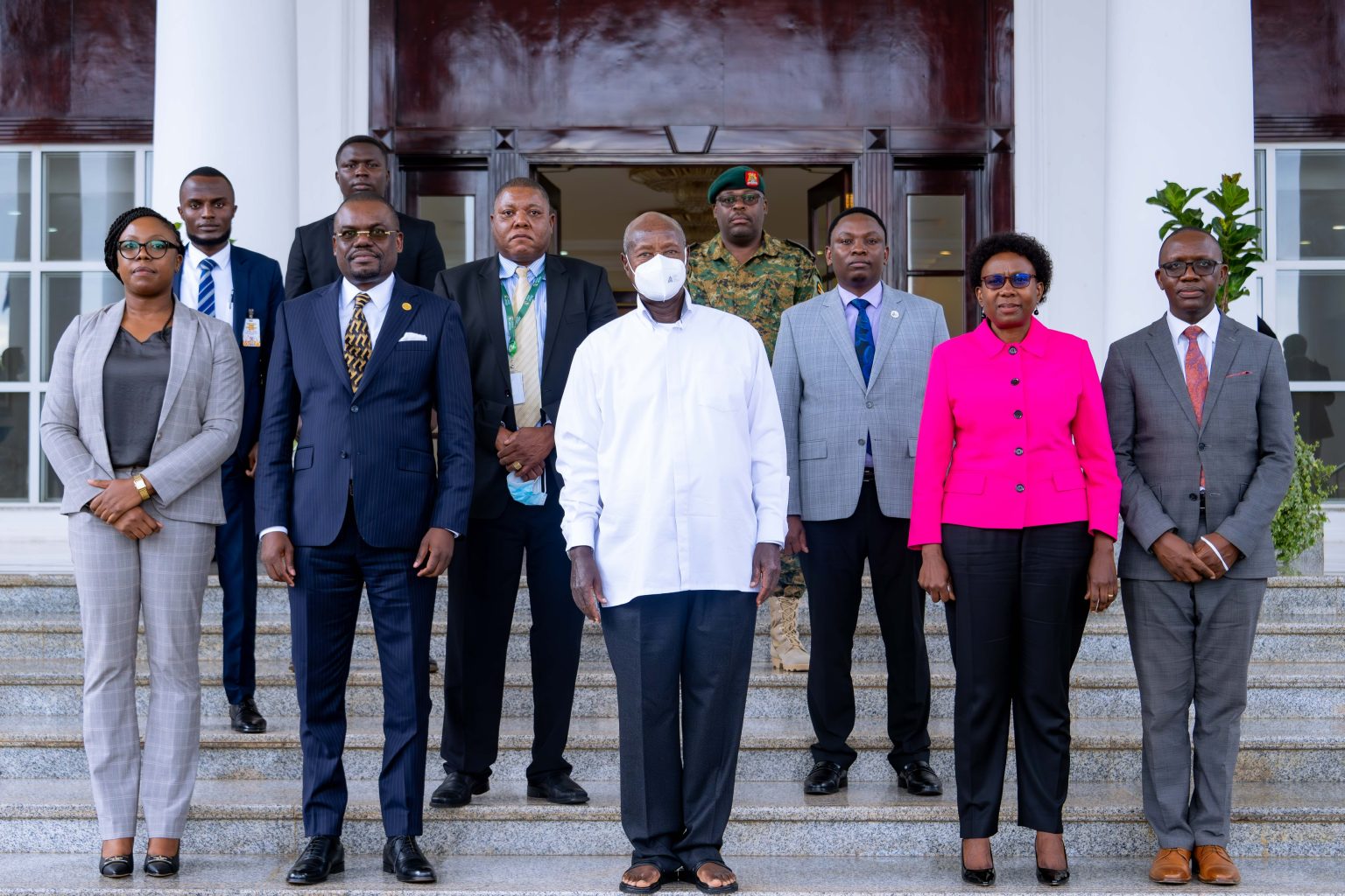 Museveni and some health officials at the state house