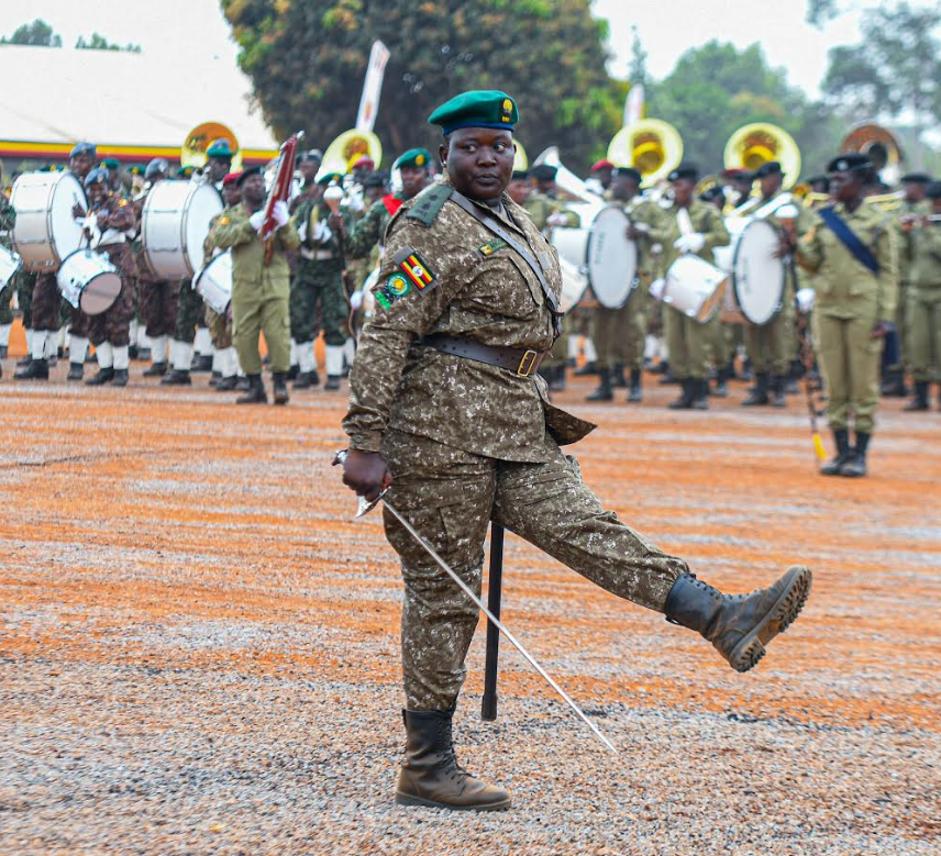 A Ugandan Female sodier marches away