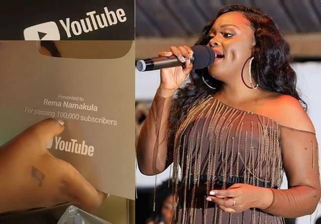 Rema shows off her YouTube 100K subscriber award