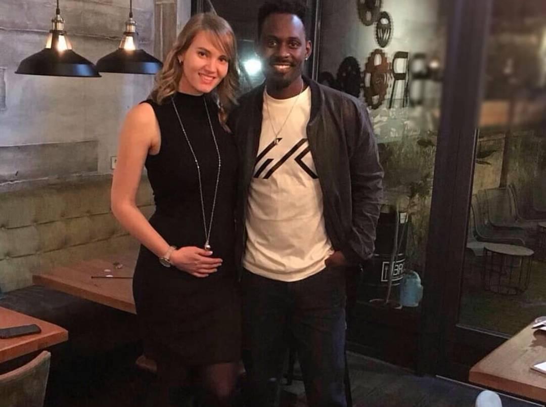 Maurice Kirya Shocks Ugandan Babes with Pregnant Muzungu.