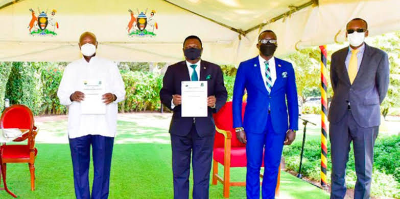 DP members drag Hon. Nobert Mao to Court over Cooperation Pact with Museveni!