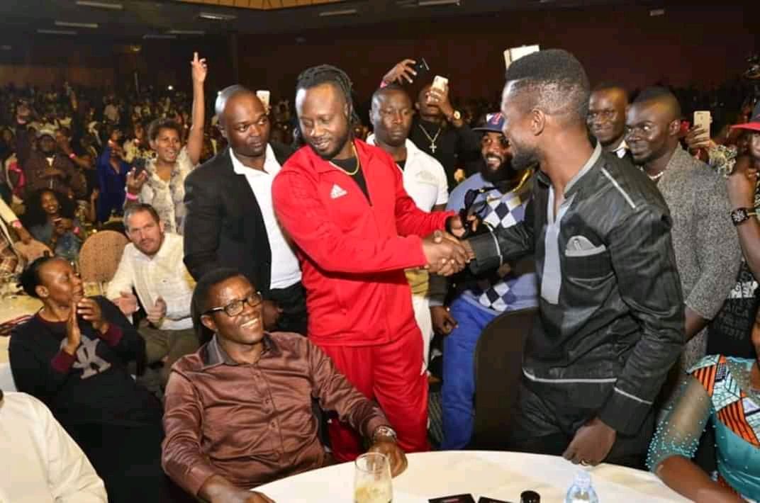 Bebe Cool Gives Bobi Wine a Hug Made in China as the two Supposedly Make Up.