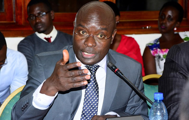 Museveni re-appoints Justice Simon Byabakama as Electoral Commission Chairman